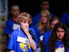 Participant Alexander Godby of St. John School in Peterborough concentrates during the senior category of the fourth annual Rotary Club of Peterborough Spelling Bee on Saturday May 9, 2015 at Fleming College's Whetting Theatre in Peterborough, Ont. Clifford Skarstedt/Peterborough Examiner/Postmedia Network