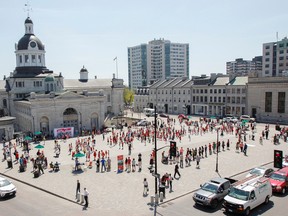 More than 300 students from grades 1 to 3/4 at Sir John A. Macdonald Public School filled Springer Market Square with their voices and energy as part of the Wonders of Music — May Day Festival in Kingston on Friday. (Julia McKay/The Whig-Standard)