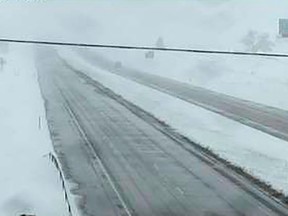 Snow covers the ground off Interstate 90 east of Sturgis, South Dakota, United States, in this view from a highway camera taken May 10, 2015.  Hail, snow, a tornado and a tropical storm made it a "severe weather" Mother's Day in much of the center of the United States and on the Carolina coast on Sunday.  REUTERS/South Dakota Department of Transportation/Handout