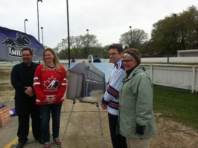 (Left to right) Norberry-Glenlee CC President Sean Fedorowich, three-time Olympian Sami Jo Small, Coun. Brian Mayes (St. Vital) and MLA Christine Melnick (Riel) stand next to an artist's rendering of the sign for the Sami Jo Small Hockey Facility at Norberry-Glenlee Community Centre on Sunday, May 10, 2015. Glen Dawkins/Winnipeg Sun