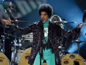 Prince performs during the Billboard Music Awards at the MGM Grand Garden Arena in Las Vegas, Nevada in this May 19, 2013 file photo. The reclusive rocker Prince was expected to take the stage May 10, 2015 in a "Rally REUTERS/Steve Marcus/Files
