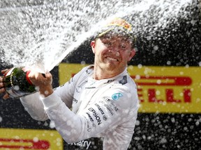 Mercedes’ Nico Rosberg celebrates after winning the Spanish Formula 1 Grand Prix yesterday. (REUTERS)