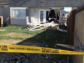 A family of seven miraculously escaped unharmed after a speeding Jeep smashed through their Edmonton home. Tom Braid/Postmedia Network