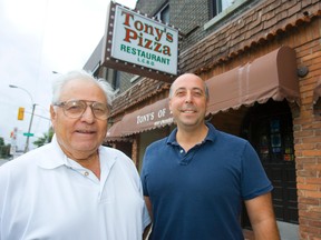 Tony Ianni, left, and his son, Vince, outside Tony's Pizza on Dundas St. (Free Press file photo)