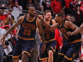 Cleveland Cavaliers forward LeBron James (23) celebrates with teammates after scoring the game-winning basket during Game 4 of the second round of the NBA playoffs Sunday against the Chicago Bulls at the United Center. (Dennis Wierzbicki/USA TODAY Sports)
