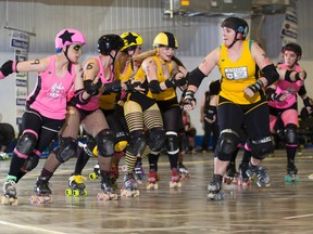 Avery Taves, left, has no trouble with the physicality of roller derby. The Lakeland College student, who hails from Medicine Hat, skated with the Angels of Assault on May 2 at the Lloydminster Golf and Curling Centre. - Eric Healey Photo/Postmedia Network