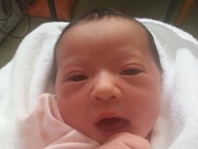Meet baby Chloe. The little girl was born to 23-year-old Ada Guan and her boyfriend Wes Branch on an Air Canada flight from Calgary to Japan on Sunday. (Facebook photo)