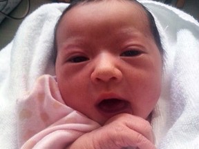 Meet baby Chloe. The little girl was born to 23-year-old Ada Guan and her boyfriend Wes Branch on an Air Canada flight from Calgary to Japan on Sunday. (Facebook)