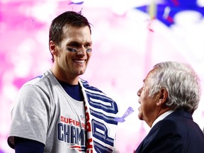 New England Patriots quarterback Tom Brady (left) celebrates with owner Robert Kraft (right) after defeating the Seattle Seahawks in Super Bowl XLIX at University of Phoenix Stadium. (Mark J. Rebilas-USA TODAY Sports)