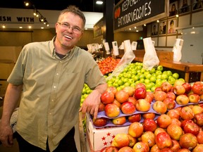 Ken Joseph is opening a new Fresh Pick Markets at Southdale and Wharncliffe in London. Joseph was busy stocking shelves on Tuesday. (MIKE HENSEN, The London Free Press)
