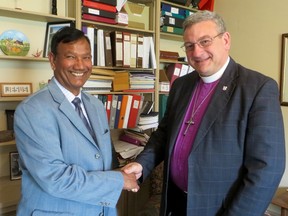 Sam Laldin,left, and Bishop Michael Oulton. (Chris O’Gorman/For The Whig-Standard)