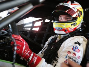 Driver Sage Karam sits in the #01 Chip Ganassi Racing with Felix Sabates Ford EcoBoost/Target Riley during the "ROAR Before the 24" at Daytona International Speedway. (Jerry Markland/AFP)