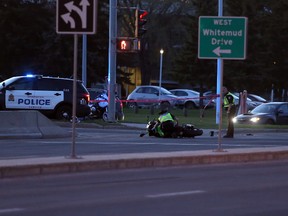 Scene of a crash between a motorcycle and a vehicle Monday night  at 122 Street and Whitemud Drive.(TREVOR ROBB/Edmonton Sun)