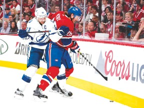 Bolts' Steven Stamkos hits Habs' Jeff Petry in Game 5. (AFP)