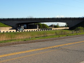 The Transportation Ministry plans to demolish the Glanworth Rd. overpass over Hwy. 401 when the interchange at Col. Talbot Rd. is rebuilt, a plan that has some farmers who use the overpass for their equipment fuming. (Postmedia Network)
