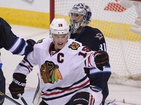 Jonathan Toews celebrates a game-winning goal against the Winnipeg Jets in March. Toews will be invested into the Order of Manitoba on July 9. (FILE PHOTO)