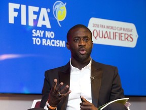 Manchester City's Ivorian midfielder Yaya Toure speaks during the launch of the FIFA's Anti-Discrimination Monitoring System at Wembley Stadium in west London on May 12, 2015, which will be implemented in the 2018 World Cup. FIFA will send observers trained by the European anti-discrimination organisation FARE to qualifying matches where there is felt to be a high risk of racist behaviour from fans. (AFP PHOTO/JUSTIN TALLIS)