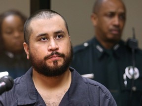 George Zimmerman listens to the judge during a first-appearance hearing in Sanford, Fla., Nov. 19, 2013.  (JOE BURBANK/Reuters/Orlando Sentinel/Pool)