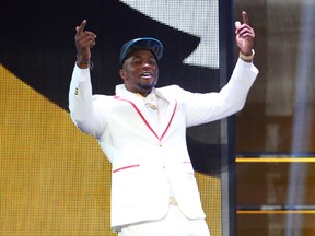 Dante Fowler Jr. is selected by the Jacksonville Jaguars third overall in the first round of the NFL draft at the Auditorium Theatre of Roosevelt University. (Jerry Lai/USA TODAY Sports)
