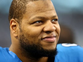 Defensive tackle Ndamukong Suh of the Detroit Lions looks on before taking on the Dallas Cowboys during the NFC Wildcard playoff game at AT&T Stadium on January 4, 2015. (Ronald Martinez/Getty Images/AFP)