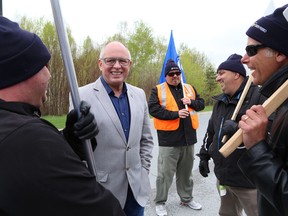 Sid Ryan, second left, president of the Ontario Federation of Labour, visited the teachers' picket line at Lasalle Secondary School in Sudbury, Ont. on Tuesday May 12, 2015. John Lappa/Sudbury Star/Postmedia Network