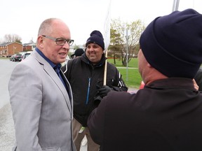 Sid Ryan, left, president of the Ontario Federation of Labour, visited the teachers' picket line at Lasalle Secondary School last week. Ryan was in town to support high school teachers from the Rainbow District School Board. John Lappa/Sudbury Star