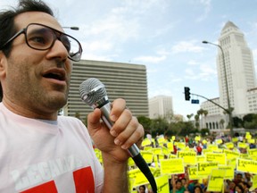 American Apparel owner Dov Charney speaks during a May Day rally protest march for immigrant rights, in downtown Los Angeles in this file photo taken May 1, 2009.  REUTERS/Mario Anzuoni/Files