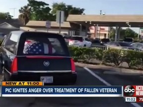 A Florida driver and funeral director have been fired for stopping at a Dunkin' Donuts while en route to a veteran's funeral with his body in the back. (Newsy Video screengrab)