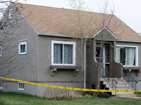 Edmonton police are investigating the death of a 64-year-old male at a home along 90 Street north of 119 Avenue, in Edmonton, Alta. on Friday May 1, 2015. David Bloom/Edmonton Sun