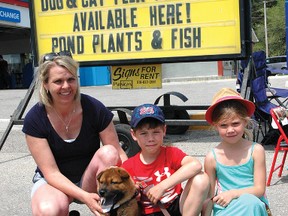 Laurie Toth and chow puppy Kyi with Connor and Megan Mullen. (CHRIS ABBOTT/TILLSONBURG NEWS)