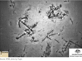 Searchers for missing Malaysia Airlines flight MH370 have found ship-related debris, including an anchor, seen here on the sea floor. The shipwreck in the depths of the Indian Ocean appears to be from the 19th century. (Supplied image Australian Government/Australian Transport Safety Bureau)