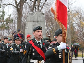 Members of the Princess of Wales Own Regiment take part in a Remembrance day ceremony at the 21st Battalion Cenotaph in City Park in Kingston on Monday November 11 2013  
IAN MACALPINE/KINGSTON WHIG-STANDARD
