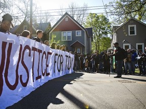 Demonstrators prepare to march down Williamson Street for the second day after the announcement that Officer Matt Kenny will not face charges in the fatal shooting of an unarmed 19-year-old biracial man, in Madison, Wisconsin May 13, 2015. Tony Robinson Jr. was shot in the head, torso and right arm by Officer Kenny, who police have said was responding to a report that a man who had battered someone was dodging traffic in the street when he encountered Robinson. REUTERS/Ben Brewer