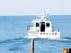 An OPP rescue boat ventures out into Lake Erie near Leamington Marina in Leamington. (Postmedia Network files)