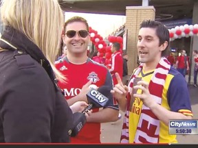 CityNews reporter Shauna Hunt confronts TFC fans Ryan Hart, left, and Shawn Simoes after a game Sunday, May 10, 2015. (CityNews TV)