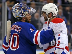 Rangers goalie Henrik Lundqvist (30) and Capitals left wing Alex Ovechkin (8) shake hands after Game 7 of the second round of the NHL playoffs in New York on Wednesday, May 13, 2015. (Adam Hunger/USA TODAY Sports)