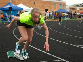 Paiten Giesbrecht of East Elgin secondary school launches off the blocks in the midget girls' 400-metre race at the Tri-County track meet Tuesday at Parkside Collegiate Institute in St. Thomas. About 500 student athletes are participating from the counties of Elgin, Middlesex and Oxford in the event that continues Wednesday, said organizer Dave Mills. (MIKE HENSEN, The London Free Press)