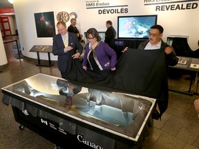 The Honourable Leona Aglukkaq, Minister of the Environment, unveiled artefacts from HMS Erebus at the Canadian Museum of History in Gatineau Wednesday May 13, 2015. The ships artefacts were displayed in a micro-exhibit at the museum and is available for the public to see May 14-18. Aglukkaq looks at a 680 pound cannon from HMS Erebus.  Tony Caldwell/Ottawa Sun/Postmedia Network