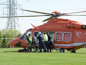 A City of Burlington worker was taken to Hamilton General Hospital via air ambulance on Thursday, May 14, 2015. (ANDREW COLLINS/Special to the Toronto Sun)