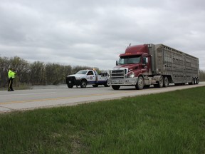 RCMP and CAA Manitoba staged a scene on the TransCanada Highway near St. Francois-Xavier May 13, 2015 where a tow truck was pulled over to the side with its lights on, set to assist a stalled vehicle. Of the 316 vehicles that drove by, almost 99% of drivers failed to slow down and move over as they passed the scene, an action punishable by a $300 fine and two demerits when enforced.