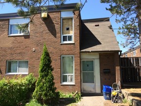 A one-month-old baby suffered serious burns when his sister, 8, sparked a fire in an upstairs bedroom of this townhouse on Driftwood Ct., near Jane St. and Finch Ave. W., on Wednesday, May 13, 2015. (CHRIS DOUCETTE/Toronto Sun)