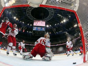 Goaltender Kevin Lalande (C) of Belarus fails to save a goal of Canada's Tyler Seguin (R) past Jordan Eberle (L) and Ivan Usenko (2nd L) of Belarus during their Ice Hockey World Championship quarterfinal game at the O2 arena in Prague, Czech Republic May 14, 2015.     REUTERS/Martin Rose/Pool