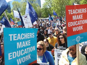 OSSTF protest on the front lawn of Queen's Park on Thursday May 14, 2015. (Veronica Henri/Toronto Sun)