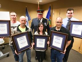 Chief's Citation Award winners, pictured with Owen Sound Police Chief Bill Sornberger include, from left, Travis Carrick, Ronald Carrick, Sarah Gray, Robert Arnburg and Dominic Nolan. (James Masters The Sun Times)