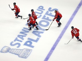 The Washington Capitals warm up before playing the New York Rangers in Game Four of the Eastern Conference Semifinals during the 2015 NHL Stanley Cup Playoffs at Verizon Center on May 6, 2015. (Patrick Smith/Getty Images/AFP)