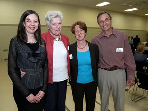 Tina Bailey, executive director of the Community Foundation of Greater Kingston, left, Linda Lysne, chair of the grants committee with two grant recipients Karma Tomm of the Queen's Conservatory of Music and Gary Giller of the Central Frontenac Railway Museum at the Community Grants announcement at the Seniors Centre on Thursday. Ian MacAlpine /The Whig-Standard)