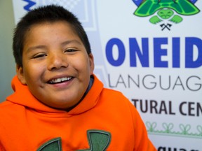 Tesha Elijah, 10, speaks in Oneida to open a new language centre. (MIKE HENSEN, The London Free Press)