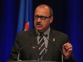 The interim leader of the Progressive Conservative Party Ric McIver speaks at the annual Calgary Leaders Dinner at the Telus Convention Centre in Calgary, Alta. on Thursday May 14, 2015. Stuart Dryden/Calgary Sun/Postmedia Network