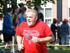 Ken Dickson takes part in the 22nd annual Wallaceburg District Secondary School Tinman Triathlon on May 14. The event, which featured a swim, bike and run, had both students, staff and community members taking part.