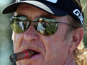 Miguel Angel Jimenez takes a break during practice at Augusta National Golf Club on April 5, 2015 in Augusta, Georgia.  (Andrew Redington/Getty Images/AFP)